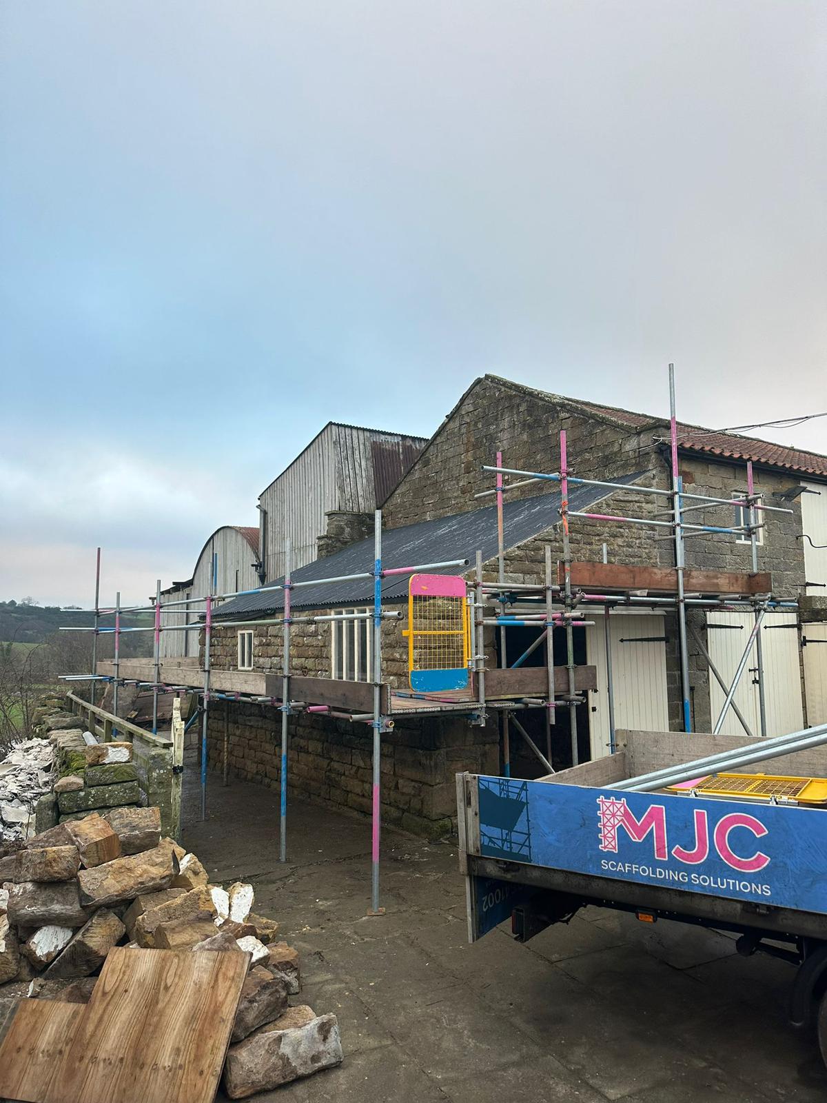 Roofing and temporary roof scaffolding