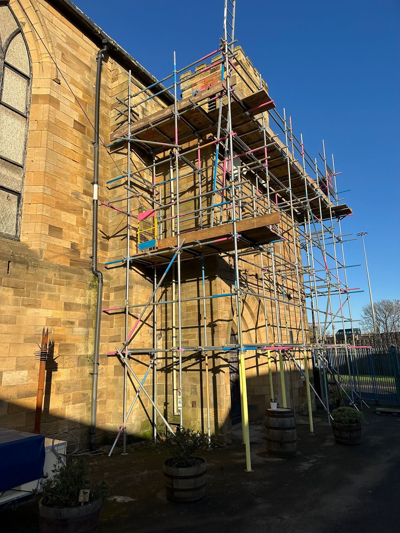 MJC scaffolding on a stone heritage building